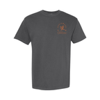 A dark gray crewneck t-shirt with a small orange graphic on the left chest featuring a falcon and the text 'Falconas'.
